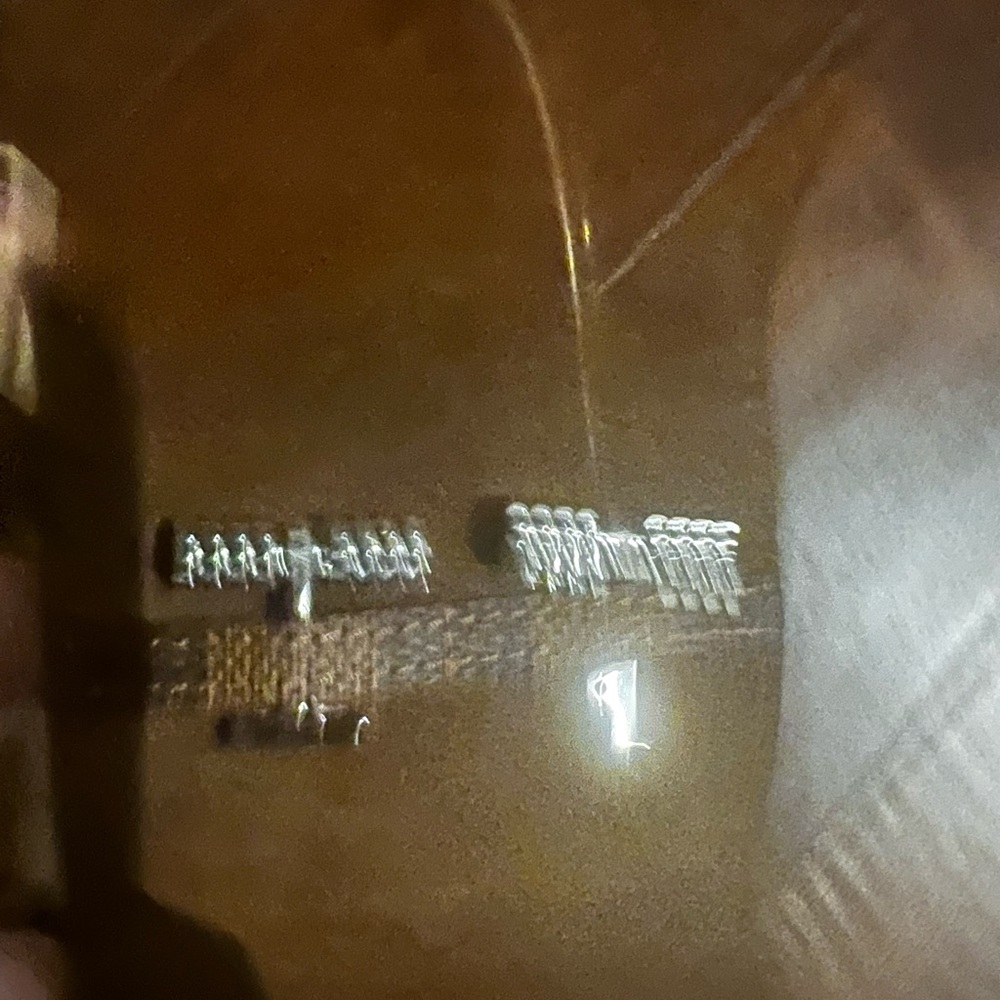 Louis Vuitton Silver and Brown Cuff Links with Intricate Design